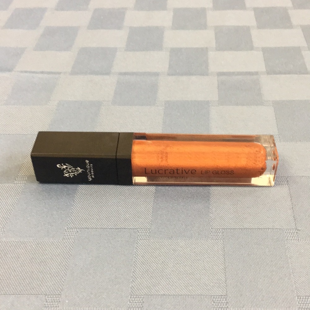 Younique Lucrative Lipgloss NEVER USED